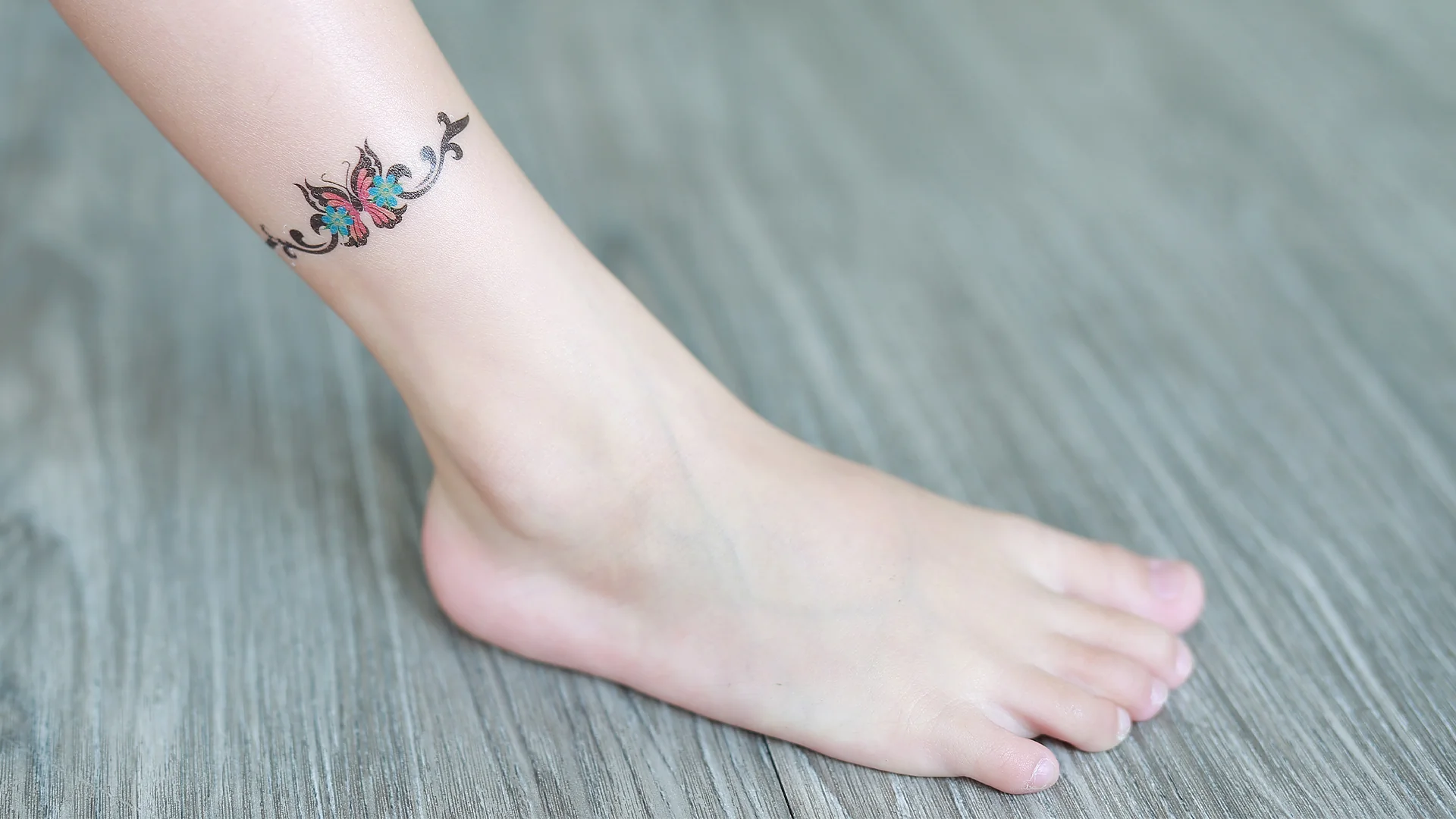 least painful tattoo spots female