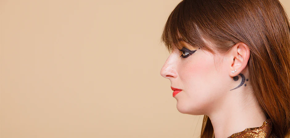 tinnitus tattoo pain under ear