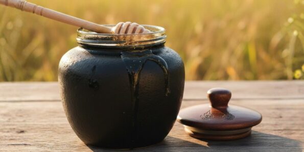 Black Thai honey product jar close up