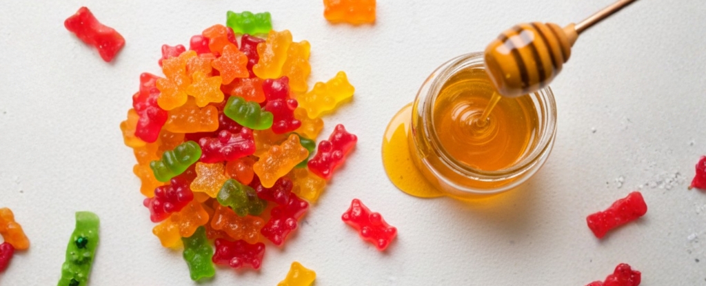 gummy supplements next to honey jar